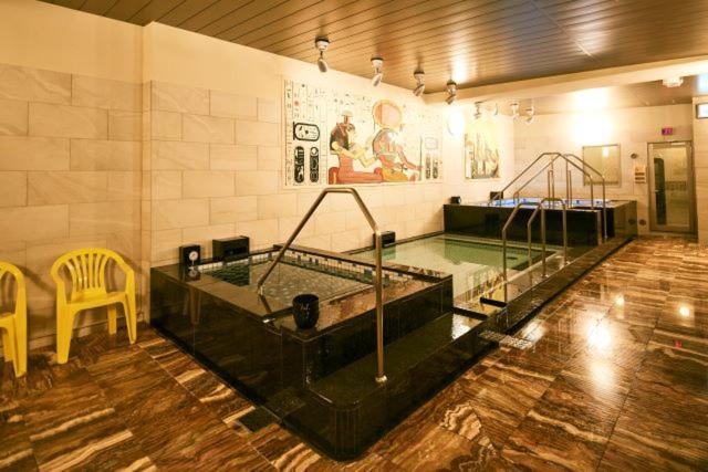 טוקיו Sauna & Cabin Thermae-Yu Nishiazabu מראה חיצוני תמונה